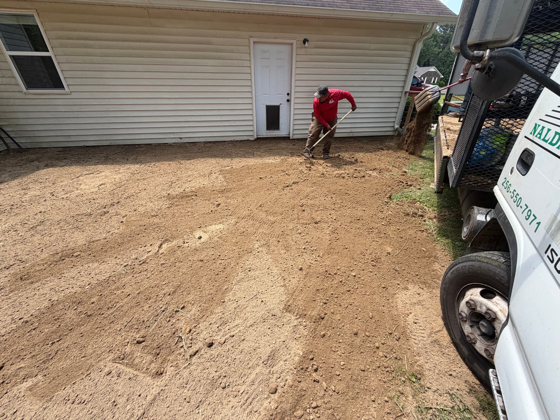 Gallery photos for Backyard Drainage Fix and Seeding to Protect a Home's Foundation: Image #1